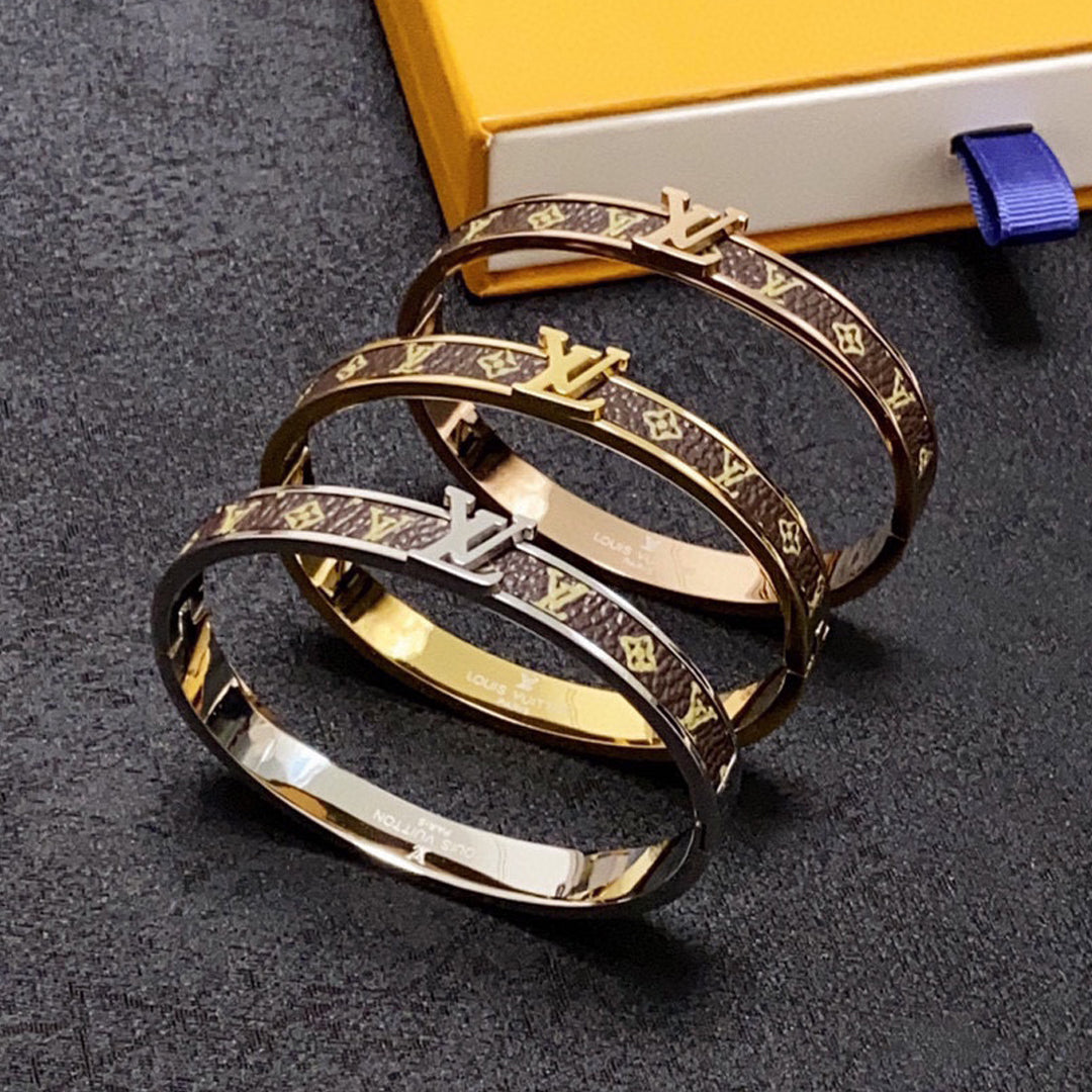 Louis Vuitton Leather Vintage 18K Gold Bracelet
